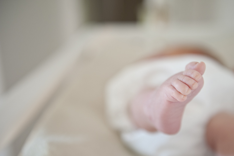 Newborn's tiny foot