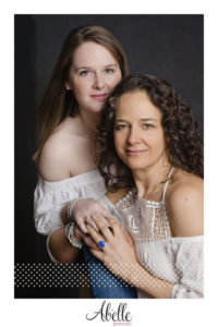 Mother daughter studio portrait by Abelle