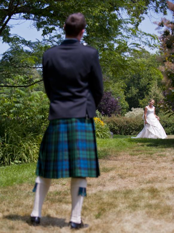 The first look. Groom sees her.