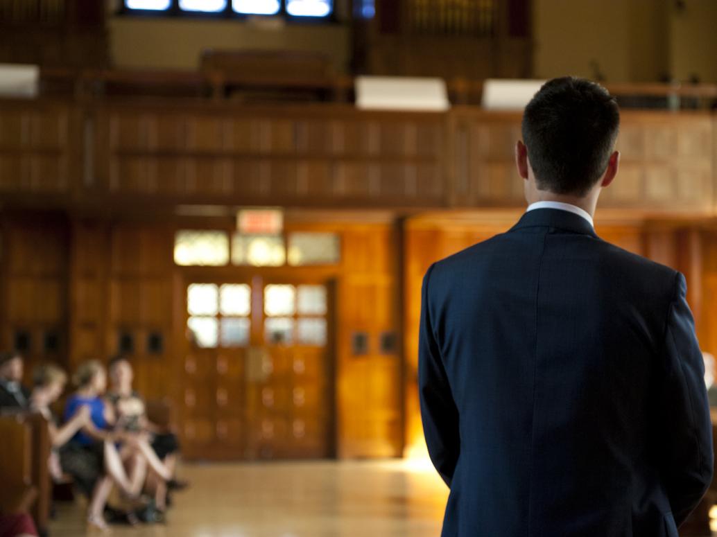 Groom waits for bride at Loyola Chapel, Montreal