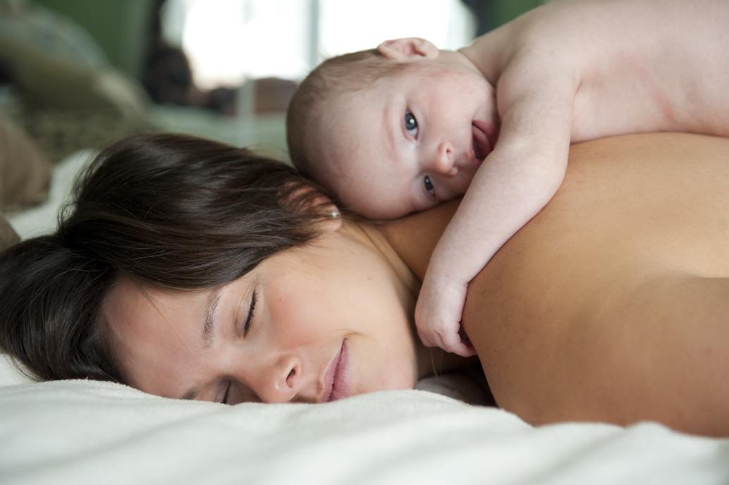 Baby photographed on mommy's back