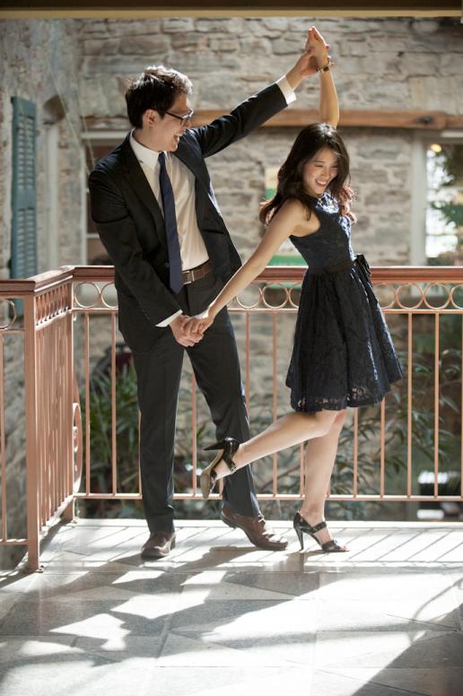 Couple dancing during engagement photoshoot